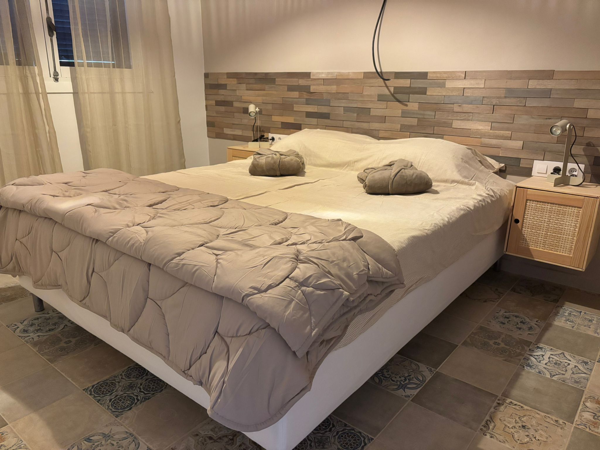 Slaapkamer met tweepersoonsbed Appartement Boven