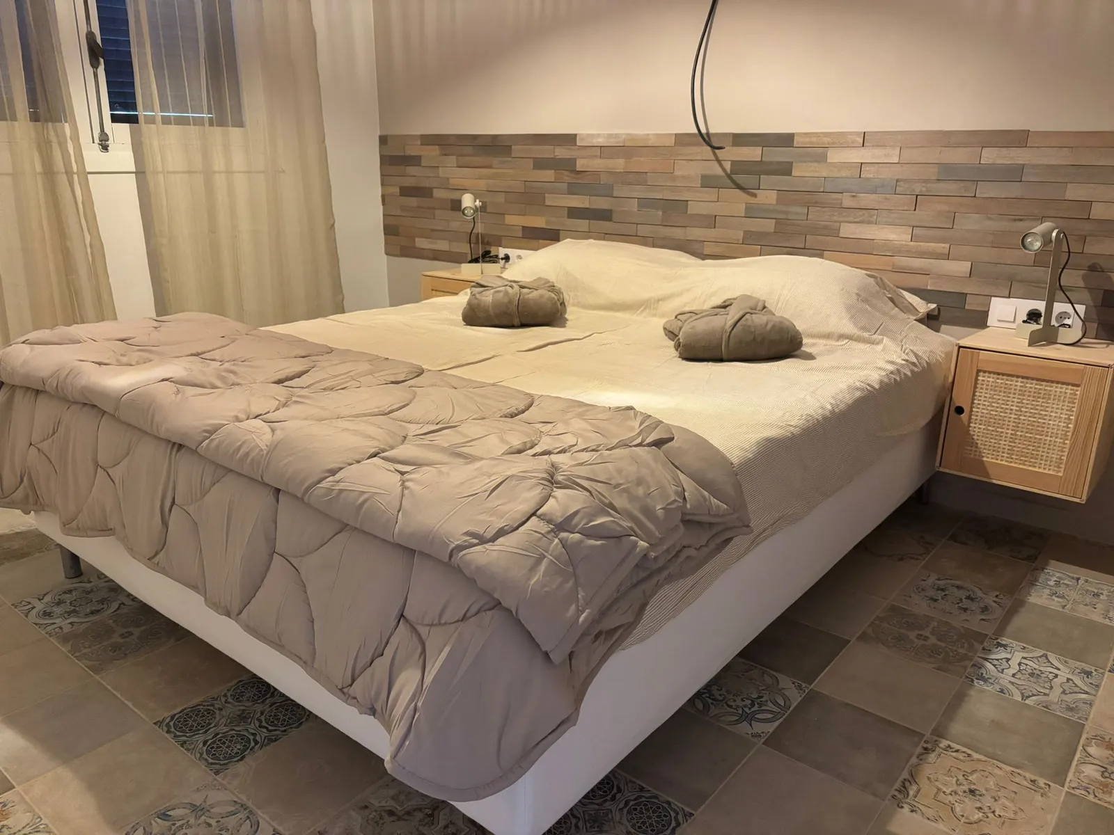 Slaapkamer met tweepersoonsbed Appartement Boven